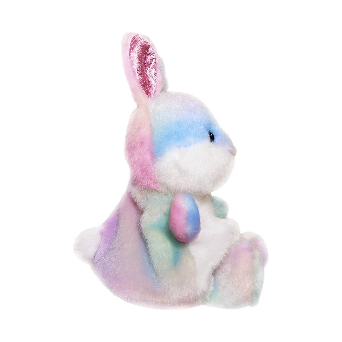 The Twice as Sweet Palm Pal Opal Rainbow Bunny is a pastel plush with soft fur, pink shiny inner ears, and a white face and belly. Sitting upright, its perfect for party decor or cuddling.