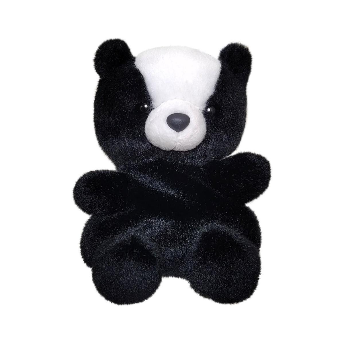 The Twice as Sweet Palm Pal Scout Skunk plush, featuring black fur, a white head patch, round ears, and a light grey snout, sits upright against a plain white background.