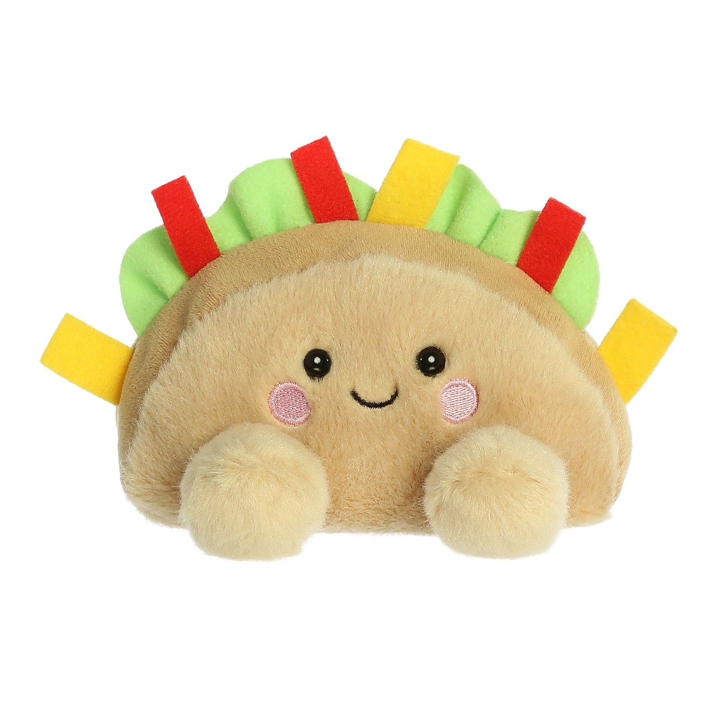 The Twice as Sweet Palm Pal Fiesta Taco is a colorful, soft plush shaped like a taco with a smiling face, pink cheeks, and green, red, and yellow felt toppings—perfect as a cheerful party companion!.