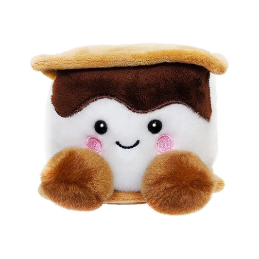 The Twice as Sweet Palm Pal Toastee Smore is a cozy plush with a smiling face, pink cheeks, shiny black eyes, fuzzy brown arms and feet, soft graham cracker top and bottom, and a chocolate layer.