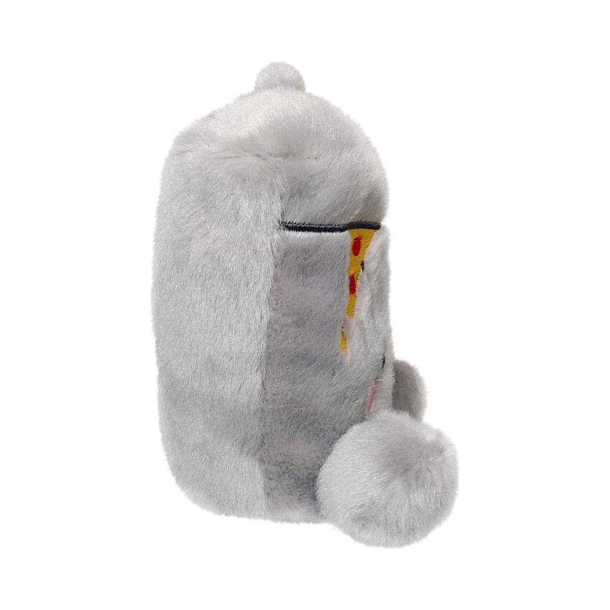 A side view of the Twice as Sweet Palm Pal Garbanzo Trashcan plush, light gray with round ears and tail, sits upright on a white background. A hint of its whimsical, party-themed design appears on the side.